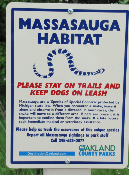 Rattlesnake advisory sign at Independence Oaks County Park.