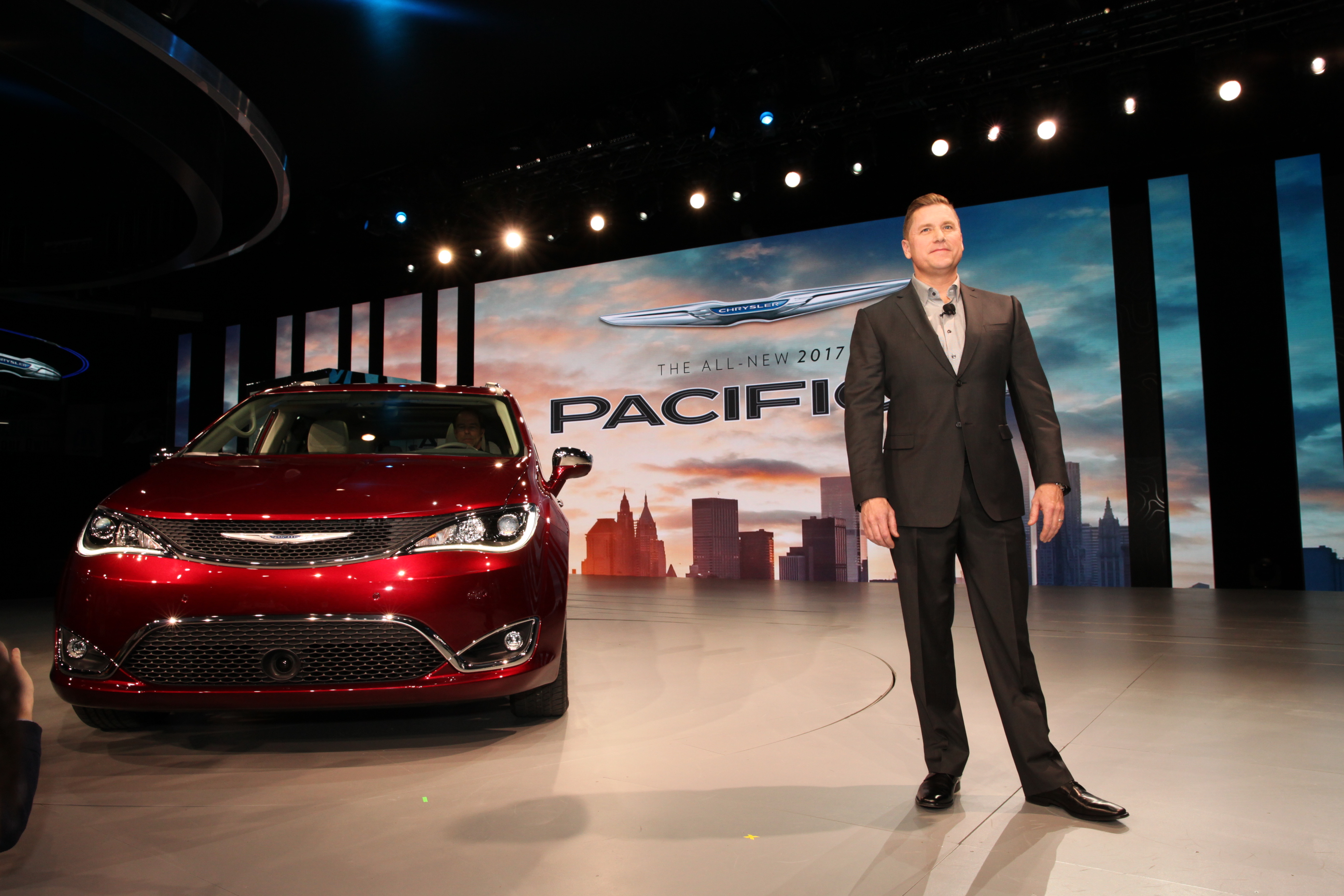 Head of Passenger Car Brands for Fiat Chrysler Automobiles, Tim Kuniskis with the new 2016 Chrysler Pacifica.