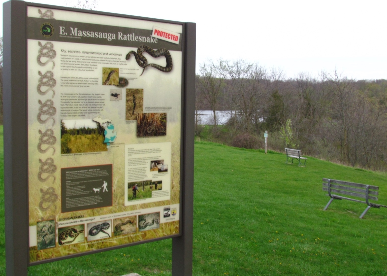Interpretive signs at Seven Lakes State Park educate visitors about massasauga rattlesnakes