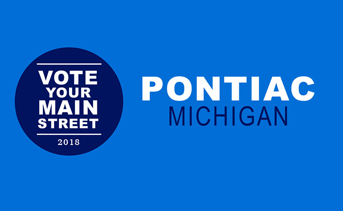 Graphic with medium blue background. A dark blue circle on the left side has text in white that reads: Vote Your Main Street 2018. Floating text on the right side of the image reads in two lines from top to bottom: Pontiac (in white) Michigan (in dark blue).
