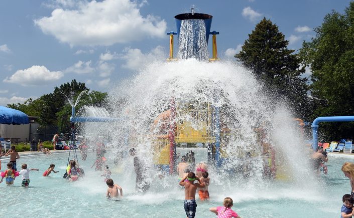 Big bucket of water at Waterford Oaks Waterpark dumping water on children